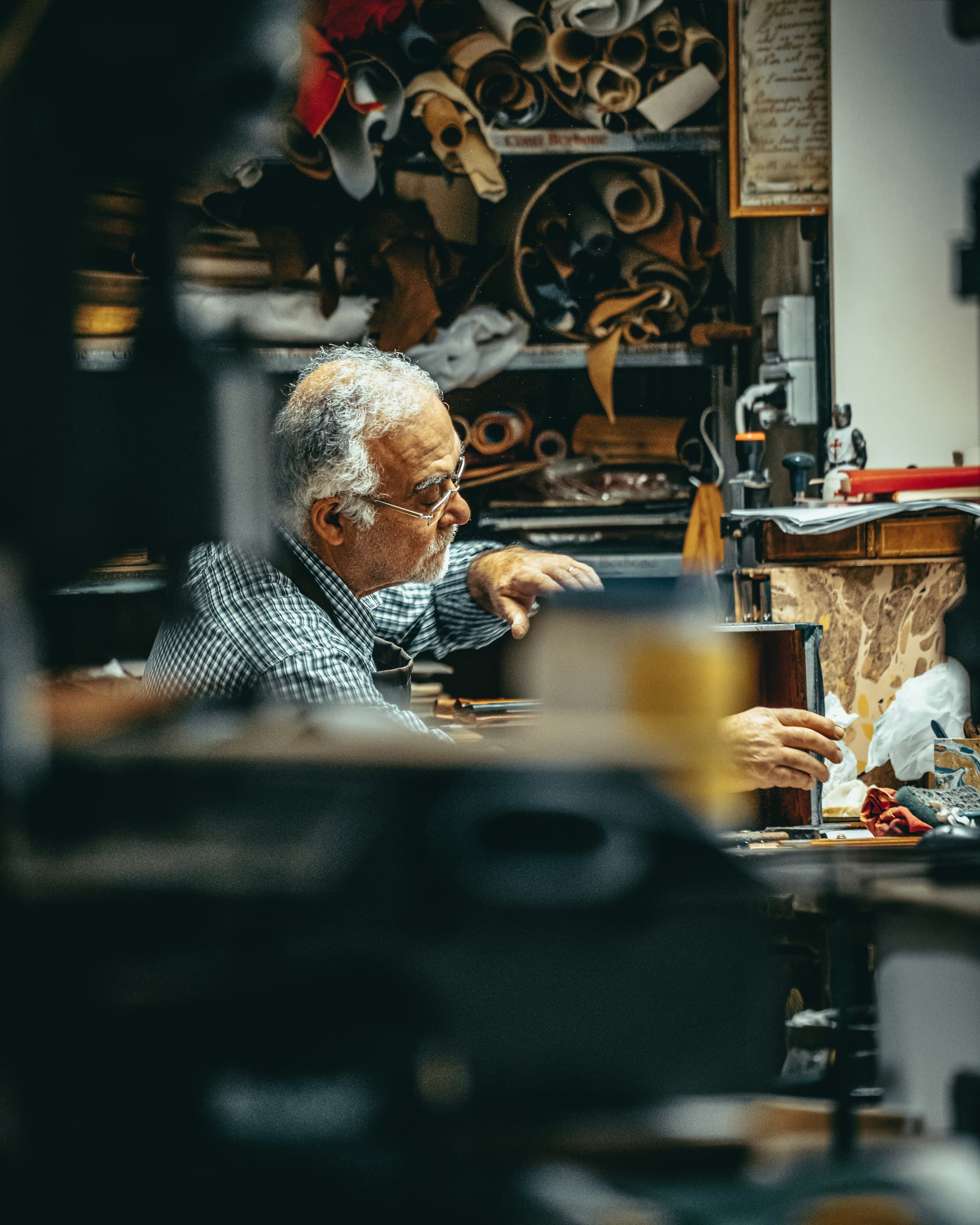 An experienced craftsman at work in a workshop